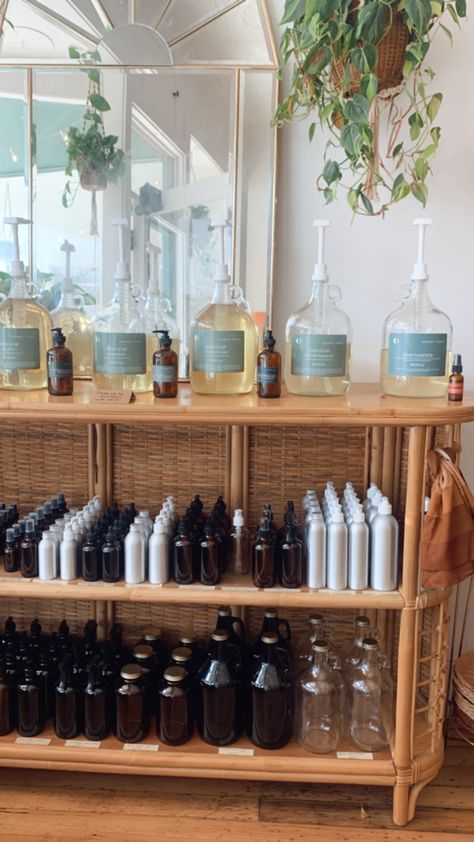 My favorite sustainable shop in STL. Dharma + Dwell offers refills on body care products like shampoo & hair spray and also household products like oxyboost and dish soap. If you’re planning a visit to Saint Louis, consider shoping small ✨ #stl #smallbusiness #refill #sustainable #zerowaste #ecofriendly #shopsmall #local #lowwaste #environment #bohemiandecor #rattan #interiordesign #sustainablepackaging Soap Refill Station, Eco Friendly Salon, How To Start A Refill Store, Refillery Store Design, Spa Boutique Ideas, Refill Store Design, Spa Product Display, Minimalist Store Design, Refillery Shop