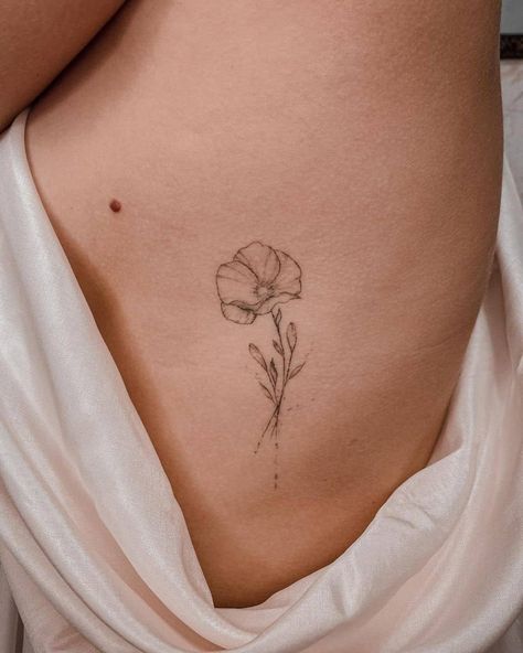 Feminine Tiny Poppy Flower Tattoo Four Flower Tattoo, Common Poppy Tattoo, Poppy Tattoo On Ribs, 3 Poppy Flower Tattoo, Cali Poppy Tattoo, Poppy Side Tattoo, Poppy Behind The Ear Tattoo, Poppy Flower Line Tattoo, Poppy Flower Rib Tattoo