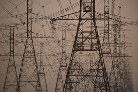 Power lines in Saudi Arabia disappear into the vastness of the desert (Joe Mc Nally, 2013) Joe Mcnally, Hunger Games Districts, Solar Punk, Transmission Tower, Power Lines, Graphic Tshirt Design, Colour Photograph, Human Nature, Anime Angel