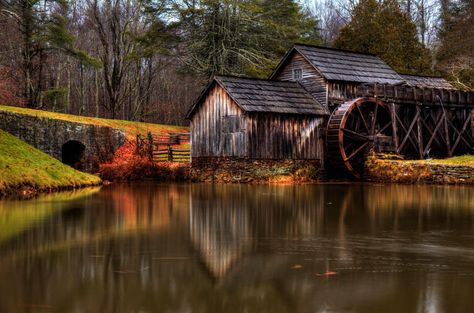 18 Reasons the Blue Ridge Parkway Is Spectacular in Fall  - HouseBeautiful.com Blue Ridge Parkway Fall, Skyline Drive, Wildlife Reserve, Grist Mill, Water Mill, Appalachian Mountains, Building Art, Water Wheel, Blue Ridge Parkway