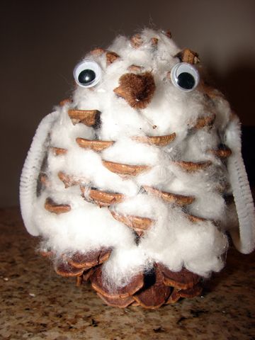 Snowy Owl craft using a pine cone and cotton balls-- a fun craft to do with little kids! Snowy Owl Craft, Cones Crafts, Owl Crafts, Pine Cone Crafts, Cotton Balls, Snowy Owl, Childrens Crafts, Nature Crafts, Winter Crafts