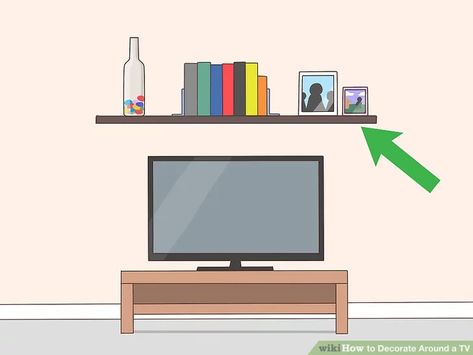 3 Ways to Decorate Around a TV - wikiHow Tv On Stand Decor, Decoration Over Tv, Shelving On Side Of Tv, How To Decorate Short Tv Stand, Floating Shelf Above Tv Living Room, Boho Decor Around Tv, Floating Shelves Over Tv, Shelf Over Tv Decor, Above Television Decor