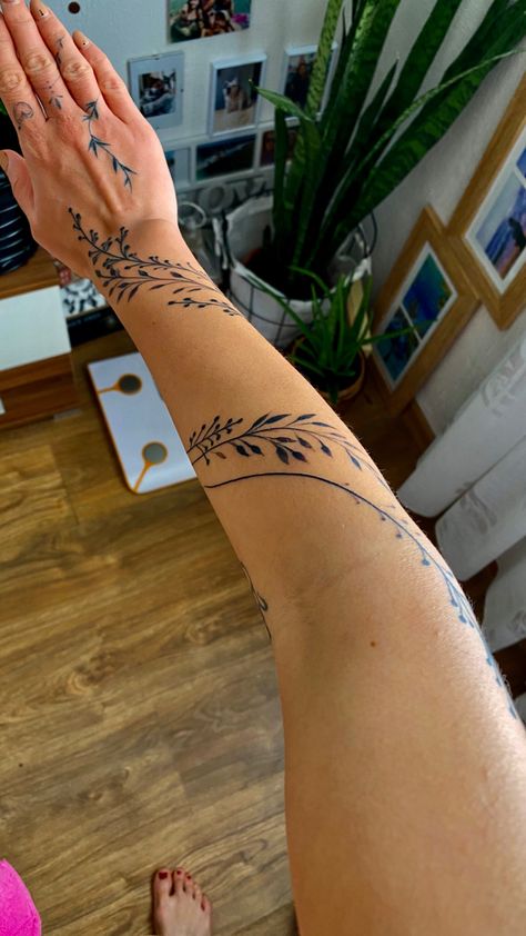 Hand Wrap Around Tattoo, Tattoos That Wrap Around, Cool Wrap Around Arm Tattoos, Spiritual Wrap Around Tattoo, Wrap Around Arm Tats, Vine Wrapped Around Arm Tattoo Sleeve, Lead Wrap Around Tattoo, One Arm Tattoo Sleeve Women, Unique Wrap Around Tattoo