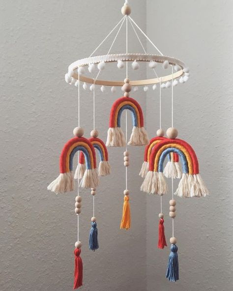 InRainbows Macrame on Instagram: "Giostrina per culla in macrame con arcobaleni e perline in legno. DM per info ——- Macrame Baby mobile with rainbows and wooden beads Info DM #macramesicilia #macramepamplona #macrameespaña #macrameitalia #fattoamanoconamore #macramemobile #giostrinaculla #giostrinapersonalizzata #giostrinamacramè #macramerainbow #weddingmacrame #macramewedding #bombonierabattesimo #regaloneonato #artisan #artisanal #slowdesign #supporthandmade #bohemianstyle #bohohomedecor Macrame Baby, Pamplona, Wooden Beads, Macrame, Baby Mobile, Rainbow, Beads, Instagram, Home Decor