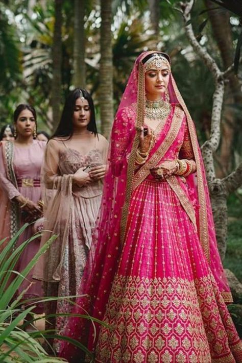 All you beautiful Brides to-be!! Tired of seeing the same old red lehenga ? Want to try something Different yet Traditional? Check out these Magenta Bridal Lehenga that would make you look exceptionally pretty at your Wedding. #indianwedding #shaadisaga #intimatewedding #lehenga #bridallehenga #weddingoutfits #indianweddingtrends #magentalehenga #indianbridal #bridalfashion #indianweddinginspiration Magenta Wedding Lehenga, Hot Pink Lengha Bridal, Lahga Design Bridal Lehenga, Bridal Lehenga Unique Colour, Wedding Ghagra Brides, Magenta Lehenga Bridal, Pink Bridal Lehenga Brides, Bride Lehenga Indian Pink, Dark Pink Lehenga Bridal