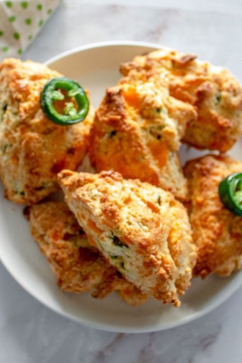 These jalapeno and cheddar scones are the perfect savory scones! These jalapeno and cheese scones are baked with cheddar cheese and jalapenos then topped with a sweet and spicy maple jalapeño glaze. Enjoy these cheese and jalapeno scones for breakfast any day of the week! Jalapeno Scones, Almond Biscotti Recipe Easy, Cheddar Scones Recipe, Savory Bakes, Cheddar Scones, Cheese Scone Recipes, Almond Biscotti Recipe, Sweet Brunch, Scones Easy