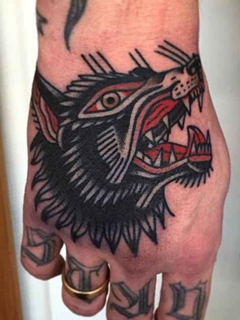 traditional wolf tattoo Wolf Tattoo Traditional, Fenrir Tattoo, Traditional Tattoo Man, Traditional Tattoo Woman, Traditional Hand Tattoo, Traditional Style Tattoo, Traditional Tattoo Sleeve, American Traditional Tattoos, Old School Tattoos