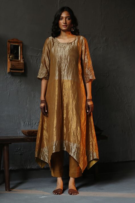 Shop for these amazing collections of Gold Kurta: Handloom Tissue Plain Round Asymmetric And Pant Set For Women by Shorshe Clothing online at Aza Fashions. Luxury Tissue Silk Palazzo Set For Designer Wear, Luxury Embroidered Tissue Silk Palazzo Set, Luxury Handloom Raw Silk Kurta, Luxury Chanderi Kurta For Celebration, Luxury Raw Silk Pants For Festive Season, Luxury Multicolor Raw Silk Kurta, Luxury Multicolor Kurta For Ceremonial Occasions, Luxury Raw Silk Floor-length Kurta, Luxury Brocade Kurta For Diwali