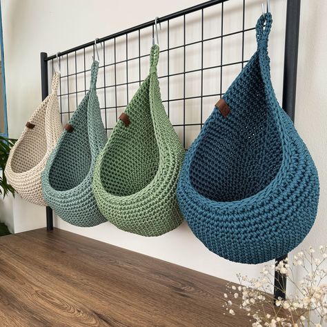 "These hanging wall baskets are ideal for rustic kitchen decoration. You can save space in your kitchen with hanging storage baskets. It is the perfect solution for storing your fruits and vegetables. It is made of polypropylene yarn. These baskets do not contain chemicals harmful to health. Extremely durable baskets are also decorative. You can use it not only in the kitchen but everywhere in your home. You can organize your supplies in the bathroom, basement, pantry and more. You can also use Hanging Fruit Baskets Kitchen, Hanging Vegetable Basket Kitchen, Kitchen Wall Baskets, Stairway Organization, Yarn Wall Storage, Wall Fruit Basket, Hanging Vegetable Basket, Shelves On The Wall, Basement Pantry