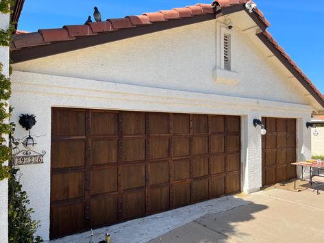 Wood Spanish colonial custom garage door arizona Spanish Garage, Colonial Garage, Brown Garage Door, Garage Woodshop, Curve Building, Garage Door House, Modern Garage Doors, Texas Home Decor, Spanish Modern