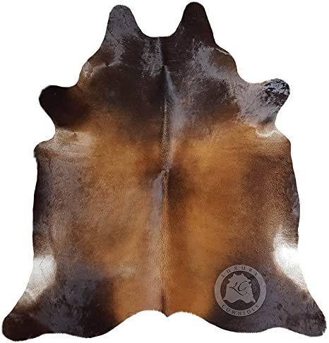 mc 042 x 081 .xorppA .tf 8 x 6 guR edihwoC ynagohaM eniune G Cow Print Carpet, Ft Pictures, Brown Cowhide Rug, Animal Skin Rug, Cow Rug, Skin Rugs, Bold Decor, Mahogany Brown, Cowhide Rugs