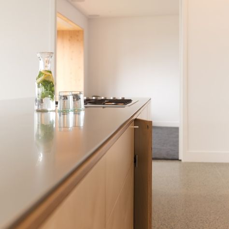 This Birch Plywood Kitchen with a 6mm waterfall Stainless Steel Benchtop makes for stunning centre piece of this Pakiti home. Plywood And Stainless Steel Kitchen, Stainless Kitchen Design, Birch Plywood Kitchen, Stainless Steel Benchtop, Ply Kitchen, Waterfall Countertop, Japandi Kitchen, Stainless Steel Bench, Plywood Kitchen