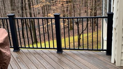 Common Deck Railing Options and Upgrades | Loudoun Deck & Fence Deck With Black Railing, Dark Grey Deck, Gray Deck With Black Railing Wood, Wood Deck Black Railings, Dark Brown Deck Black Railing, Black Aluminum Deck Railing, Composite Deck With Black Railing, Composite Railing, Grey Deck