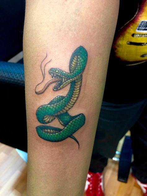 Green snake tattoo done by Jon Koon at Artistic studio hair and tattoo Singapore Colored Snake Tattoo, Green Snake Tattoo, Cobra Tattoo, Green Snake, School Tattoo, Pretty Tattoos For Women, Snake Tattoo, Tattoo Work, Tattoo Stencils