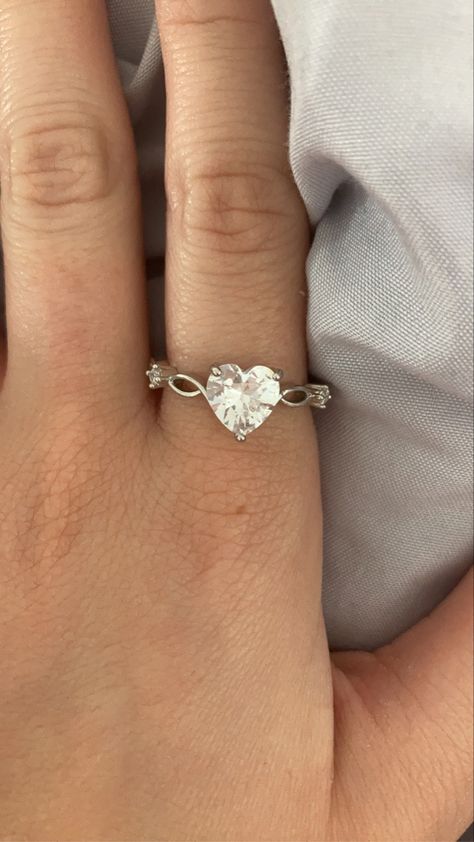 heart shaped diamond ring on hand Coquette Engagement Ring, Coquette Ring, Coquette Wedding Ring, Coquette Rings, Coquette Wedding, Meaningful Rings, Heart Wedding Rings, Dream Wedding Ring, Silver Heart Ring