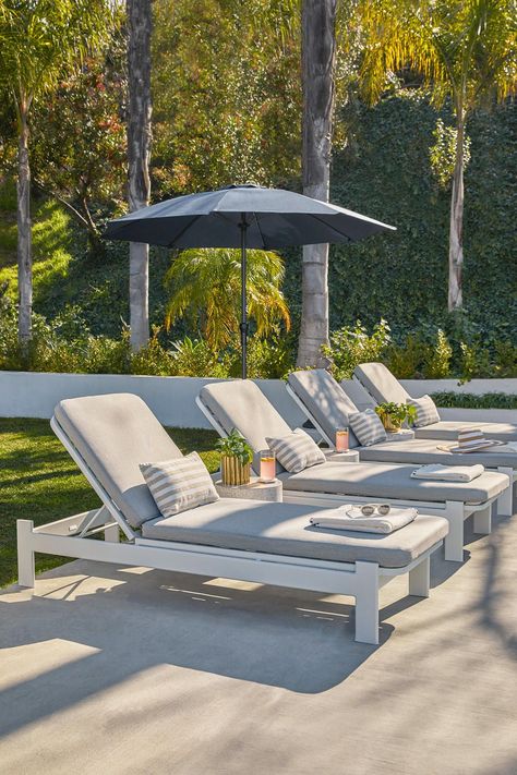 Building the perfect outdoor chill area will be all the rage this summer. #PatioDesign #PatioFurniture #OutdoorLiving Pool Patio Furniture, Mid Century Modern Outdoor, Outside Pool, Pool Lounge Chairs, Ground Pool Ideas, Pinterest Trends, Outdoor Loungers, Pool Chairs, Front Courtyard