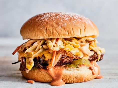 Oklahoma Onion Burgers with Creamy BBQ Coleslaw Recipe | Food Network Kitchen | Food Network Bbq Coleslaw, Short Rib Sandwich, Onion Burgers, Bbq Short Ribs, Rib Sandwich, Onion Burger, Primal Kitchen, Coleslaw Mix, Smash Burger