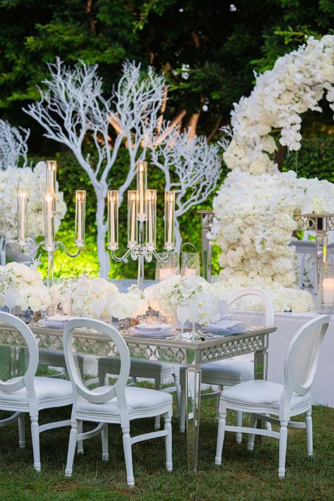 Frosted glass and mirrored accents help to tie together this Frozen inspired wedding. Frozen Wedding Theme, Disney Wedding Venue, Frozen Wedding, Orchid Bouquet Wedding, White Floral Arrangements, Disney Weddings, Disney Fairy Tale Weddings, Wedding Themes Winter, Frozen Inspired