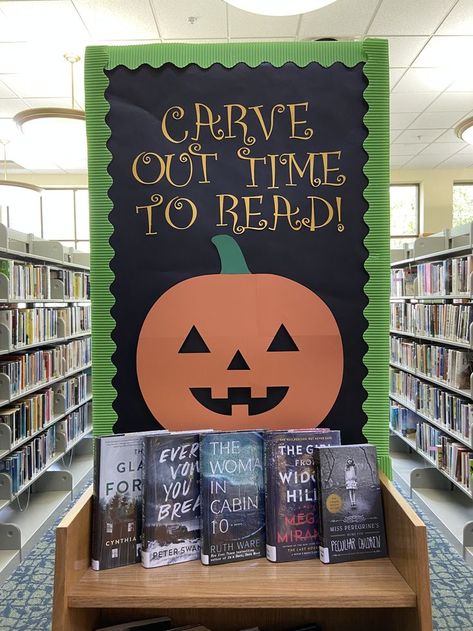 Carve Out Time For Reading, Halloween Book Fair Ideas, High School Library Book Display Ideas, October Bulletin Board Ideas For Library, Seasonal Library Displays, Library Trunk Or Treat Ideas, Space Library Display, Halloween Displays Library, Halloween Library Bulletin Board Ideas