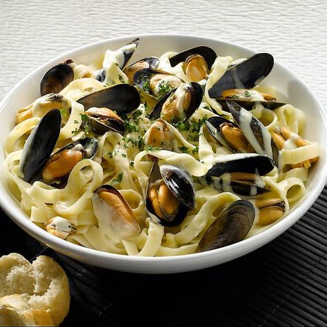 Mussels with creamy white wine sauce, served on a bed of tagliatelle Lemon Garlic Mussels Pasta, Pasta With Muscles, Muscles Pasta Recipe, Muscles And Pasta Recipe, Muscle Pasta Recipe, Mussels Linguine, Mussels Pasta Recipe, Muscles Recipe, White Wine Pasta Recipes