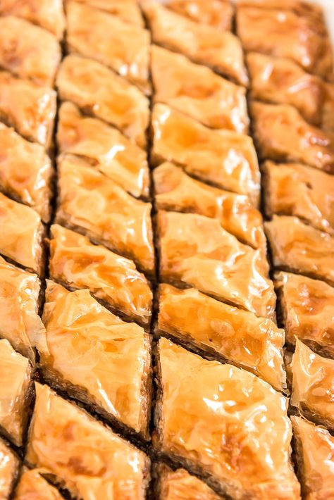 This easy and Classic Baklava recipe is loaded with layers of cinnamon, nuts, and butter and saturated in a simple honey syrup! Everyone will love this sweet and sticky dessert! Traditional Baklava Recipe, Easy Baklava Recipe, Easy Baklava, Baklava Recipe Easy, Greek Baklava, Greek Pastries, Baklava Recipe, Greek Desserts, Sweet Rolls