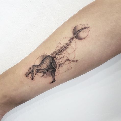 Dinosaur Tattoo   #tattoo #dinosaur #geometrictattoo #skeleton Dinosaur Tattoo For Men, Mens Dinosaur Tattoo, Dinosaur Forearm Tattoo, Shark And Dinosaur Tattoo, Dinosaur Tattoo Men, T Rex Skeleton Tattoo, Dinosaur Bones Tattoo, Whale Skeleton Tattoo, Dinosaur Skeleton Tattoo