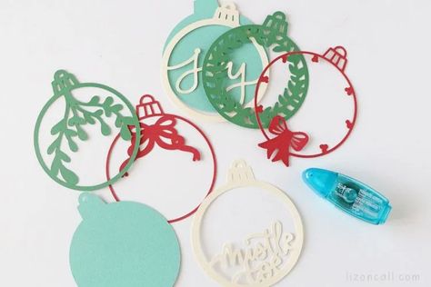 Layered Paper Ornaments, Layered Paper Christmas Ornaments, Cricut Christmas Tags, 3d Paper Ornaments, Cricut Gift Ornament Svg, Paper Ornaments Christmas, Free Layered Svg Files, Layered Ornaments, Layered Ornament Svg