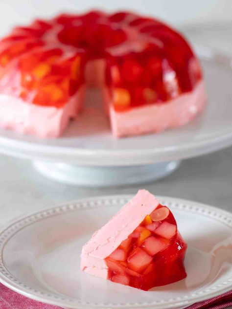 Jello Mold with fruit salad and Cool Whip from The Black Peppercorn #jello #jellomold Jellosalad #coolwhip Fruited Jello Recipes, Thanksgiving Jello, Jello Fruit Salads, Jello With Fruit, Recipes With Cool Whip, Jello Mold Recipes, Jello Dessert Recipes, Layered Jello, Gelatin Recipes