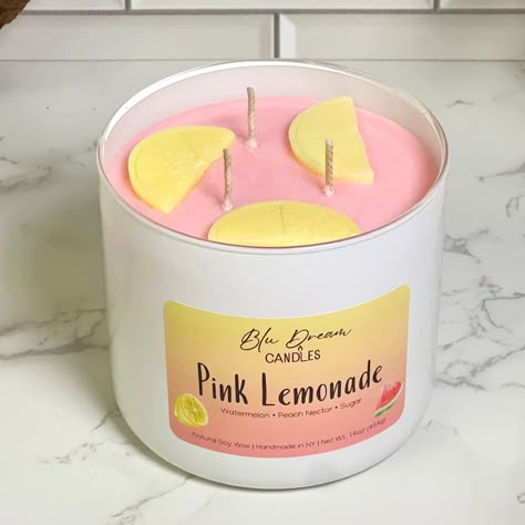 Like a sunny day in a bottle, with zesty lemon, sweet raspberry, and refreshing grapefruit at the forefront. Rounded out by hints of ripe strawberry, sugary musk, and creamy vanilla, creating a delightful and uplifting scent reminiscent of enjoying a glass of pink lemonade on a warm summer day. Top Notes: Watermelon, Lemon, Green LeavesMiddle: Strawberry, Pineapple, GardeniaBase: Sugar, Vanilla Burn Time: 80+hrs When first lighting your candle, please allow it to burn for at least 1-2 hours or until the surface of the candle is completely melted. This will prevent tunneling! To maintain the most out of your candle please keep your wicks trimmed to 1/4th of an inch, this will ensure an even burn and prevent smoke and buildup around the candle jar. Do not burn your candle for more than 4 hou Cute Aesthetic Candles, Candle Inspo Aesthetic, Preppy Candles, Animale Crossing, Watermelon Candle, Summer Candle Scents, Strawberry Candle, Candle Labels Design, Pearl Candle