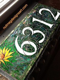 Wordless Wednesday: Mosaic House Number in Green with the Sun Shining Mosaic House Numbers, House Plaques, Mosaic Madness, Mosaic Art Projects, Glass Mosaic Art, Mosaic House, Sun Shining, Mosaic Garden, Mosaic Projects