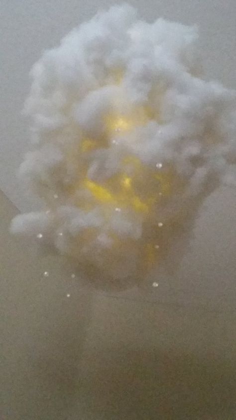 https://www.etsy.com/listing/285835129/rain-cloud-night-light-chaldelier-lamp?ref=listing-shop-header-1   The light comes with a remote control with eight unique settings to make the cloud flash with a fun lightning storm, or softly glow in a soothing ambient light. Beautiful crystals hang gently from the cloud, replicating rain drops reflecting the light from the cloud.  Each cloud is handmade and unique, and measures roughly 2-3 feet in diameter. It comes with a hook to hang from the ceiling Cloud Ceiling Light, Cloud Ceiling, Rain Lights, Cloud Night Light, Cotton Clouds, Cloud Lights, Rain Clouds, Lightning Storm, Rain Drops