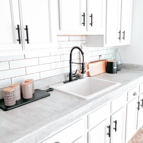 Instagram - farmhouseish Kitchenette Countertop Ideas, Kitchenette Sink Ideas, White Kitchenette, Ripping Up Carpet, Wet Bar Sink, Leftover Tile, Basement Kitchenette, Brown Laminate, Dining Table Makeover