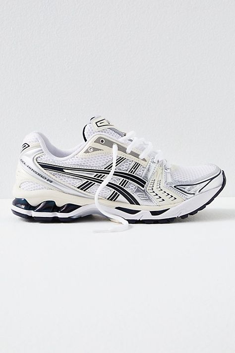 Inspired by your favorite trainers from the early 2000s, these sporty sneakers from Asics combine vibrant gel details with performance technology you know and love. **Features:** Low-boot construction, mesh and leather layered uppers, gel midsole cushioning, vibrant tooling details, rubber outsole, secure lace closure **Why We | Gel-kayano 14 Trainers Shoe by ASICS at Free People in White/Midnight, Size: US 8 Gel Asics Outfit, Gel Kayano Asics Outfit, Acisis Shoes, Asics Shoes Outfit, Asics Outfit Black Woman, Asics Aesthetic, Asics Kayano, White Asics, Asics Trainers