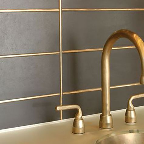 You can also use metal inlays for high-design look and feel. Bringing metallic into your tile work adds shine and polished mixed-media approach. Tile With Gold Grout, Metallic Grout, Gold Grout, Interior Materials, Renovation Inspiration, Ceramic Floor Tile, Bathroom Design Trends, Tile Trends, Flooring Trends