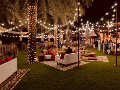 This Wedding Had The Most Amazing Outdoor Seating Ideas! | WedMeGood Lawn Reception Decor, Night Reception Decoration Indian, Simple Indian Wedding Decor, Sangeeth Decors Outdoor Night, Outdoor Sangeet Decor Night, Sangeet Decoration Night Outdoor, Sangeet Theme, Festival Seating, Outdoor Seating Ideas