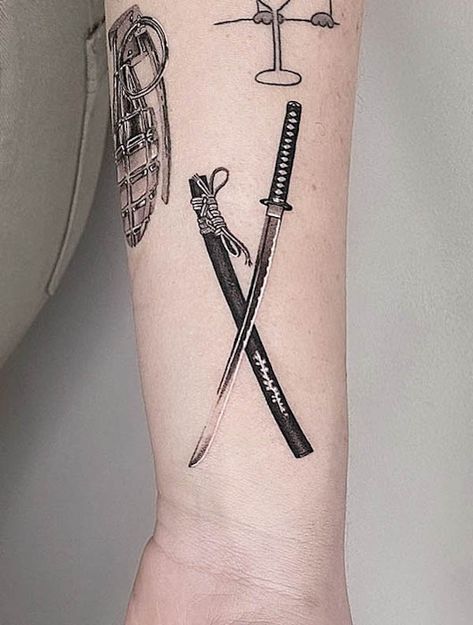 52 Stunning Sword Tattoos With Meaning - Our Mindful Life Samurai Swords Tattoo, Japanese Dagger Tattoo, Small Samurai Tattoo, Full Arm Tattoos, Omerta Tattoo, Red Ink Tattoos, Dagger Tattoo, Badass Tattoos, Tattoo Meaning