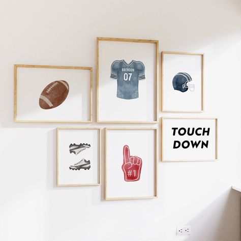 Add a personalized touch to your little athlete's nursery with this charming set of 6 football-themed wall art pieces. Perfect for a blue sports nursery decor, these Kids Sports Wall Art pieces feature customizable names for a truly unique touch. Whether you're decorating for your own child or looking for a thoughtful baby shower gift, this custom set is sure to delight. Each piece is carefully crafted to bring a playful and sporty vibe to the room, making it a standout decor piece. Upgrade your Boy Blue Room Ideas, Sporty Nursery, Vintage Football Nursery, Football Themed Nursery, Boy Sports Nursery, Boy Nursery Sports, Sports Themed Nursery, Vintage Sports Nursery, Football Nursery