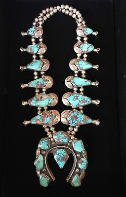 BEAUTIFUL BISBEE AQUA TURQUOISE SQUASH BLOSSOM NECKLACE. TURQUOISE SQUASH BLOSSOM NECKLACES. HOW THEY ACQUIRED SUCH LOVELY PIECES. WHEN YOU ADMIRE OTHERS COLLECTIONS YOU WONDER. ASCENDING FROM 5"W TO 3"W TOWARD THE CLASP. Luxury Southwestern Turquoise Necklace With Natural Stones, Cheap Traditional Turquoise Jewelry, Navajo Turqoise Necklace, Luxury Turquoise Jewelry For Statement Piece, Women Wearing Turquoise Jewelry, American Indian Silver Jewelry, Cheap Vintage Turquoise Jewelry, Luxury Traditional Kingman Turquoise Necklace, Luxury Multicolor Southwestern Turquoise Necklace