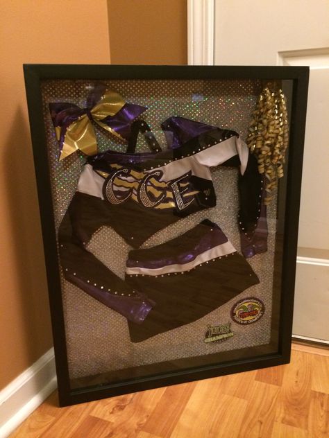 Shadow box cheer uniform Cheer Uniform Shadow Box Ideas, Cheer Uniform Shadow Box, Cheer Bedroom, Cheer Room, Cheer Box, Cheerleading Jumps, Cheer Banquet, Allstar Cheer, Cheer Photography