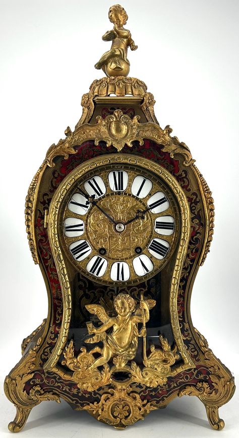 Original ormolu cartouche dial with enamel roman numerals  original hands Circa 1850  very nice original example  visible sunburst pendulum Original finish  8 day bell striking french movement Working Order, recently serviced Measures 48cm high by 26cm wide & 23cm deep  Stunning French Boulle Mantle clock, inlay brass case decoration, top mythical bronze ormolu cherub trumpeter finial, stands on 4 scrolled ormolu feet. Very Good condition for age all original and in good working order. Good cond Art Deco Interior Bedroom, Art Deco Clock, Home Clock, Clock Repair, Bar Stools With Backs, Vintage Timepiece, Barometer, Antique Clock, Mantle Clock