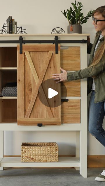 Woodshop Diaries | Shara on Instagram: "Slide into the new year with creative (and cute!) storage solutions! This sliding door dresser (?) / chest of drawers (?) … honestly, I’m not sure what to call it 🙈🤣 BUT, whatever it is, it’s a beautiful and unique storage solution for a bedroom, bathroom, office or living space. I built it from basic construction lumber and plywood (my favorite combination 😉) and used some inexpensive cedar fence pickets for the door and drawer fronts for a pop of warm wood color. I’m sharing all the project details, plans, and full how to video so you can follow along to make your own on woodshopdiaires.com. Comment PLANS below and I’ll send you the link to the printable plans 🙌 Happy building, friends! #storagesolutions #diywoodworking #woodworking #diyfurnitu Cedar Fence Pickets, Unique Storage, Drawer Fronts, Wood Shop, Diy Woodworking, Lumber, Chest Of Drawers, Sliding Doors, Wood Colors