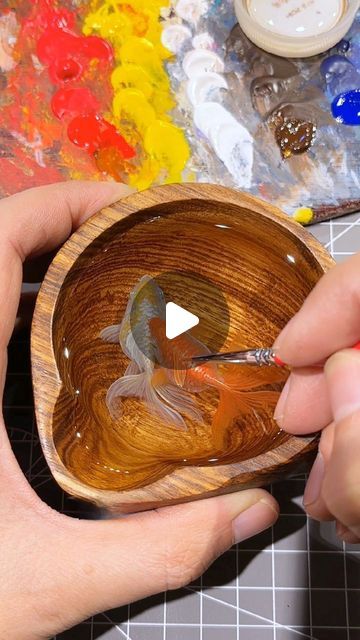 Feif Dong on Instagram: "Drawing a Life like goldfish🥰🥰🥰 Epoxy resin & acrylic painting a 3D goldfish  #epoxy #epoxyresin #epoxyart #EpoxyResinArt #epoxypainting #acrylic #3dart #3dartwork #ResinPainting #acrylicpainting #Resinpaintings #resinpaint #amazing #amazingart #amazingvideo  #satisfying #satisfyingvideos #satisfy #satisfyingvideo #satisfyingart #satisfyingslimevideo  #satisfyingslimes #satisfyingvids #satisfyingpainting #koi #artcraft #goldfish #3dpainting" How To Paint 3d Fish In Resin, Koi Fish Resin Art, Koi Fish Painting Video, Resin Fish Pond, Koi Pond Resin Art, Koi Painting, Golden Fish, 3d Painting, Epoxy Resin Art