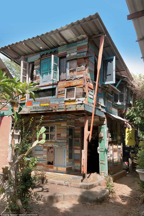 The Love Art Studio, designed by Kitpong Ngowsiri in Phuket, Thailand, is one of many artists' houses built in a U-shape to create an alcove community.  Eight artists started building their own homes back in February 2011, each in the individual style of the artist. These homes have since become their  studios and galleries and there is a communal area where owners hold events such as live music and workshops for children, according to The Phuket News Artists Houses, Artist Shed, Communal Area, Reclaimed Brick, House Shed, Lots Of Windows, Air Bnb, Artist House, Phuket Thailand