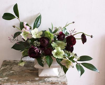 Winter centerpiece with Hellebores and ranunculus Hellebore Flower Arrangements, Faux Arrangements, Winter Centerpiece, Urn Arrangements, Winter Floral Arrangements, Arrange Flowers, Winter Centerpieces, Lenten Rose, Winter Bouquet