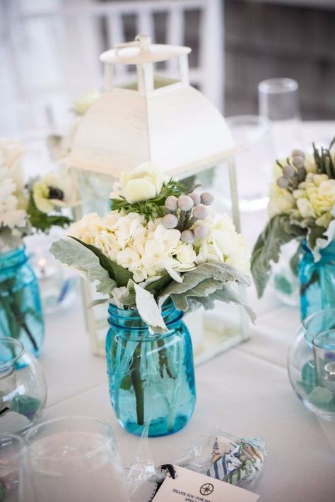 DIY Wedding Centerpieces -Rustic Blue Mason Jar Wedding Centerpiece - Do It Yourself Ideas for Brides and Best Centerpiece Ideas for Weddings - Step by Step Tutorials for Making Mason Jars, Rustic Crafts, Flowers, Modern Decor, Vintage and Cheap Ideas for Couples on A Budget Outdoor and Indoor Weddings #diyweddings #weddingcenterpieces #weddingdecorideas Blue Mason Jar Centerpieces, Tiffany Blue Wedding Decorations, Babyshower Centerpieces, Turquoise Wedding Decorations, Wedding Centerpieces Diy Rustic, Quinceanera Bouquet, Bouquet Centerpiece, Wedding Jars, Wedding Centerpieces Mason Jars