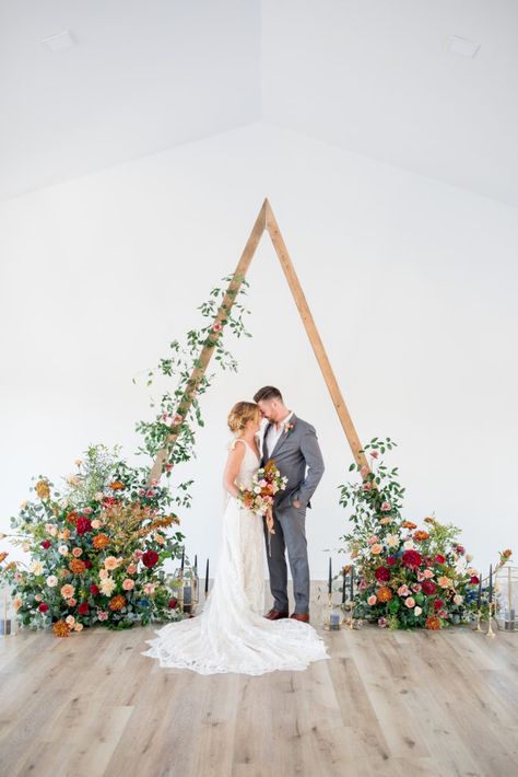 fall wedding ceremony boho arch Triangle Floral Arch, Triangle Arbor Wedding Flowers, Wedding Arch Ideas Triangle, Triangle Arbor With Flowers, Triangle Arch Decor, Triangle Arbor Wedding, Triangle Arch Flowers, Triangle Arches, Triangle Arbour