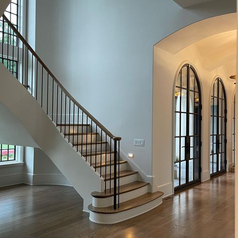 This week getting settled in.. still waiting on several pieces of furniture to arrive, and need to purchase a couple more. I have an art… | Instagram Luxury Home Inspiration, Suburban Staircase, Curved Staircase Foyer, Staircases Ideas, Old Money Interior Design, Old Money Interior, Hidden Staircase, Luxury Stairs, Foyer Staircase