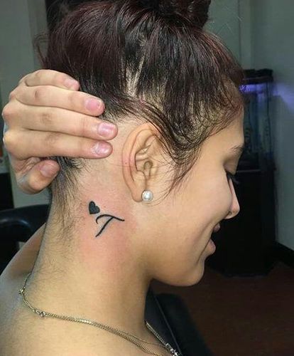 T Name Tattoo Designs, T Letter Tattoo Designs For Women, T Initial Tattoo Letters, Neck Tattoo Initials, Behind The Ear Tattoo Ideas Initials, Letter A Tattoo Ideas For Women, Initial T Tattoo, Letter T Tattoos Initials, Tattoo Initials Letters Ideas