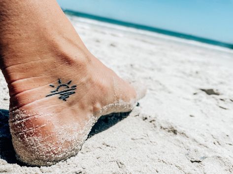 Beach Tattoo Ideas Men, Water Tattoo Simple, Sun Beach Tattoo, Salty Tattoo, Beach Tattoo For Men, Sun And Ocean Tattoo, Ankle Tattoo Men, Beachy Tattoos, Lake Tattoo