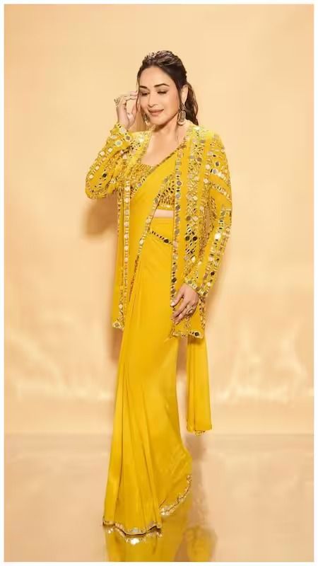 15 Madhuri Dixit Inspired Stylish Designer Sarees For Modern Elegance Mirror Work Saree Blouse, Yellow Mirror, Seema Gujral, Saree Jackets, Long Blouse Designs, Haldi Outfits, Sewing Collars, Saree Draping, Modern Saree